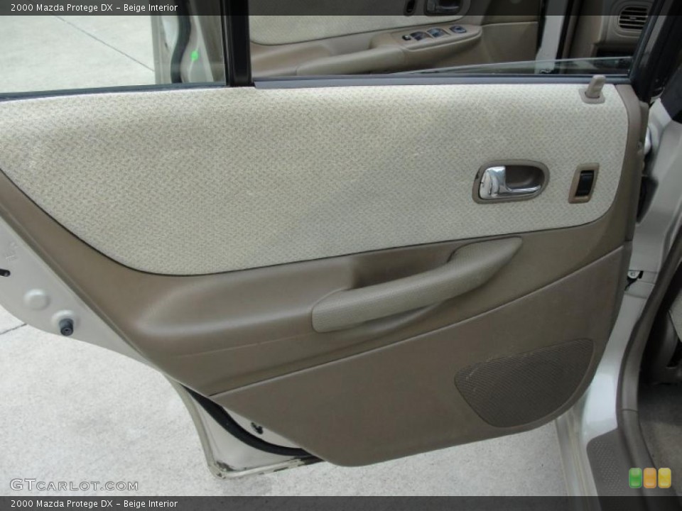 Beige Interior Door Panel for the 2000 Mazda Protege DX #48054329