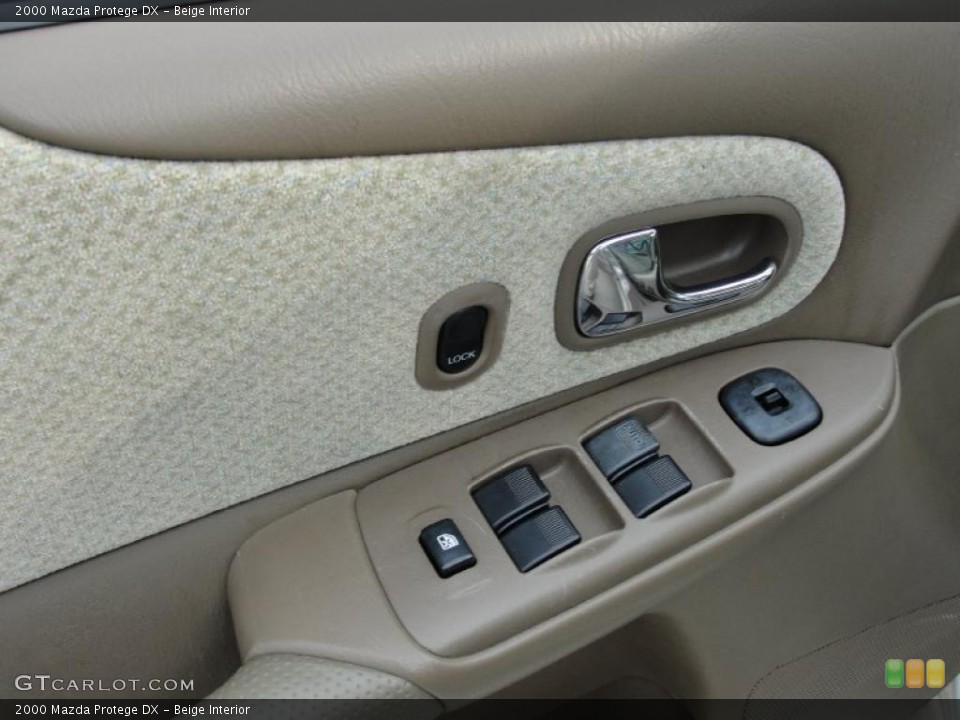 Beige Interior Controls for the 2000 Mazda Protege DX #48054374