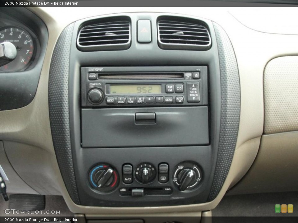 Beige Interior Controls for the 2000 Mazda Protege DX #48054446