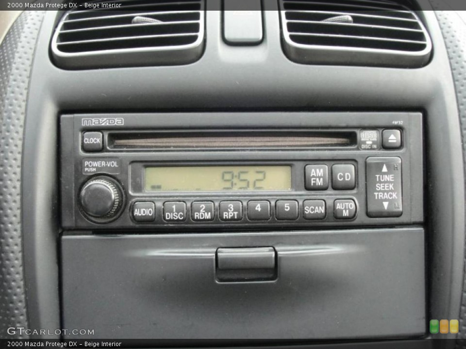 Beige Interior Controls for the 2000 Mazda Protege DX #48054461