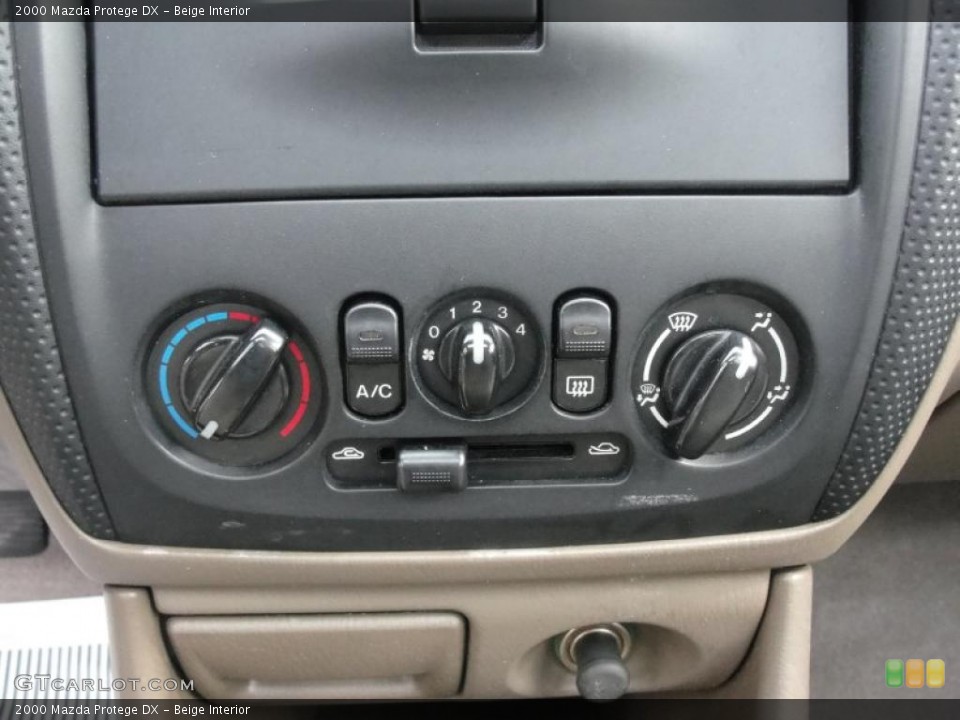 Beige Interior Controls for the 2000 Mazda Protege DX #48054476