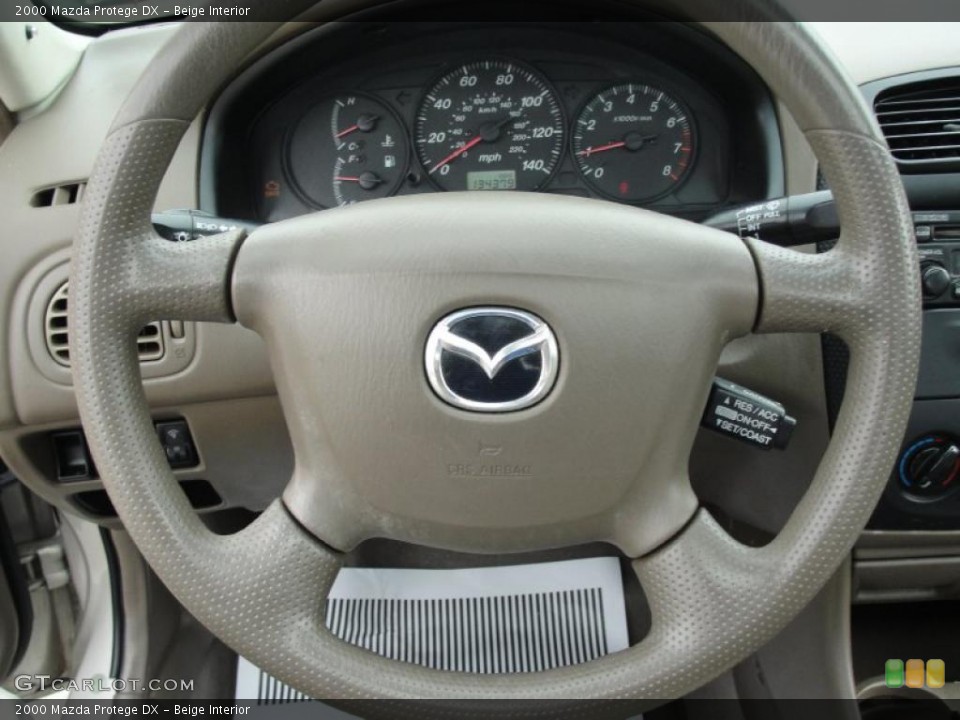 Beige Interior Steering Wheel for the 2000 Mazda Protege DX #48054503