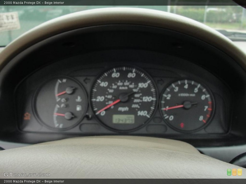 Beige Interior Gauges for the 2000 Mazda Protege DX #48054518
