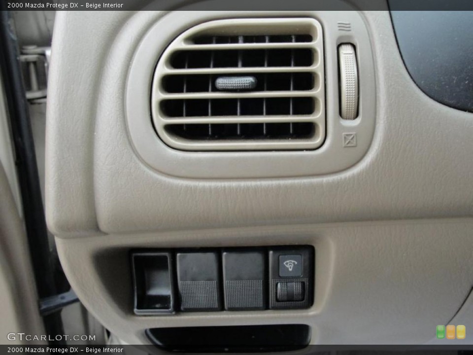 Beige Interior Controls for the 2000 Mazda Protege DX #48054548