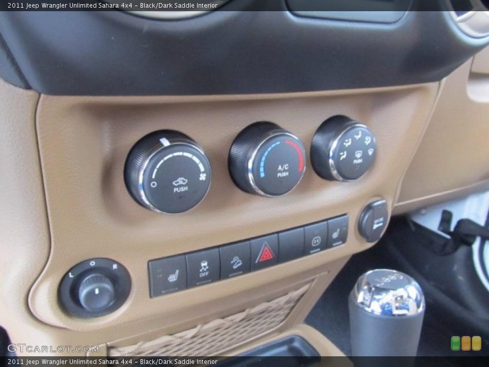 Black/Dark Saddle Interior Controls for the 2011 Jeep Wrangler Unlimited Sahara 4x4 #48055646