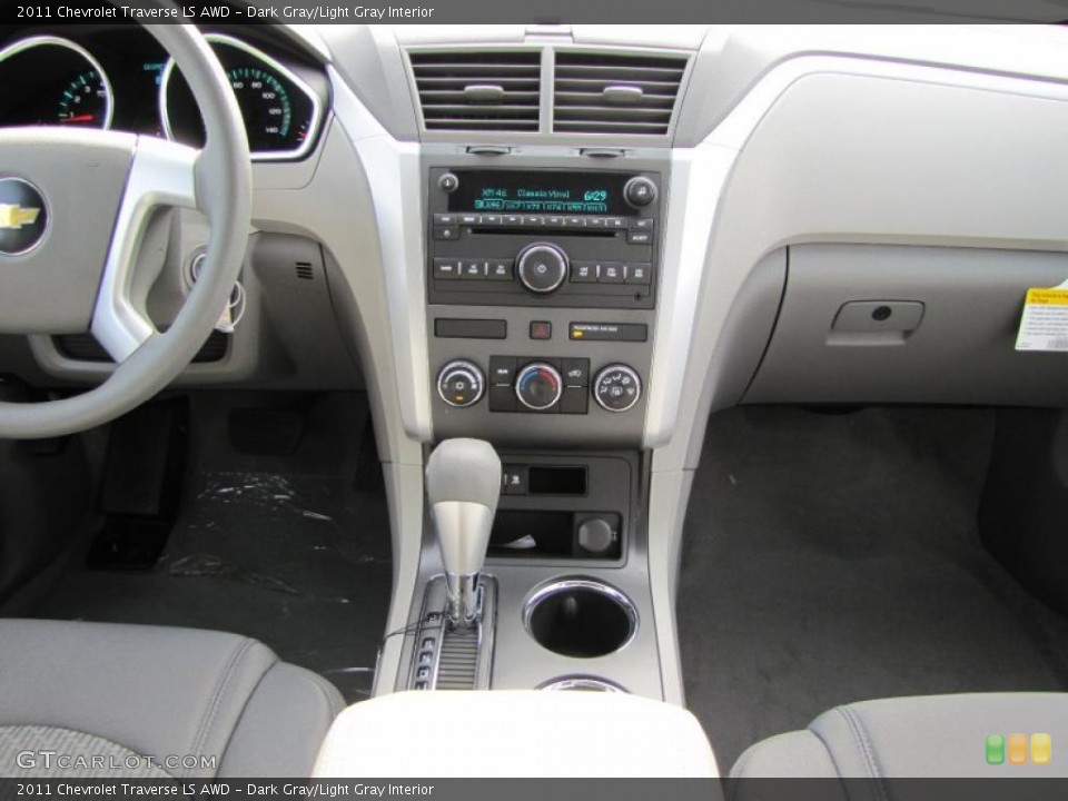 Dark Gray/Light Gray Interior Controls for the 2011 Chevrolet Traverse LS AWD #48062489