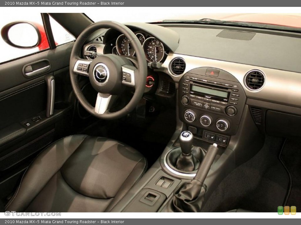 Black Interior Dashboard for the 2010 Mazda MX-5 Miata Grand Touring Roadster #48065684