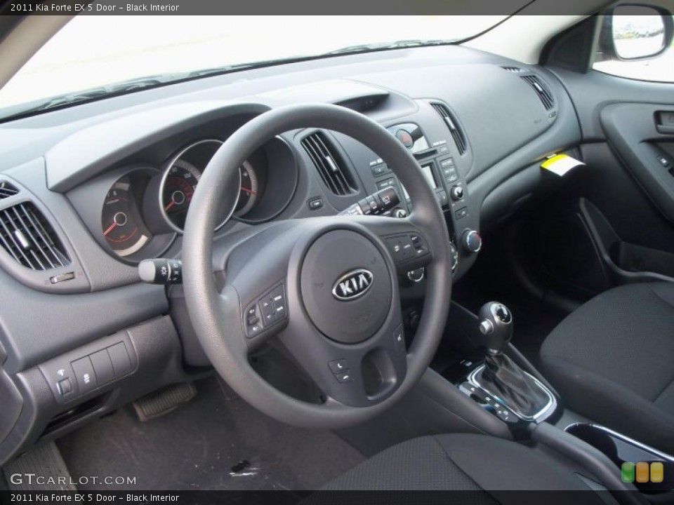 Black Interior Prime Interior for the 2011 Kia Forte EX 5 Door #48078456