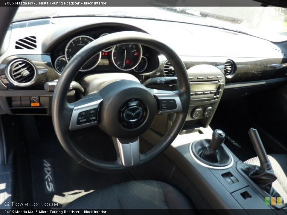 Black Interior Dashboard for the 2006 Mazda MX-5 Miata Touring Roadster #48088281