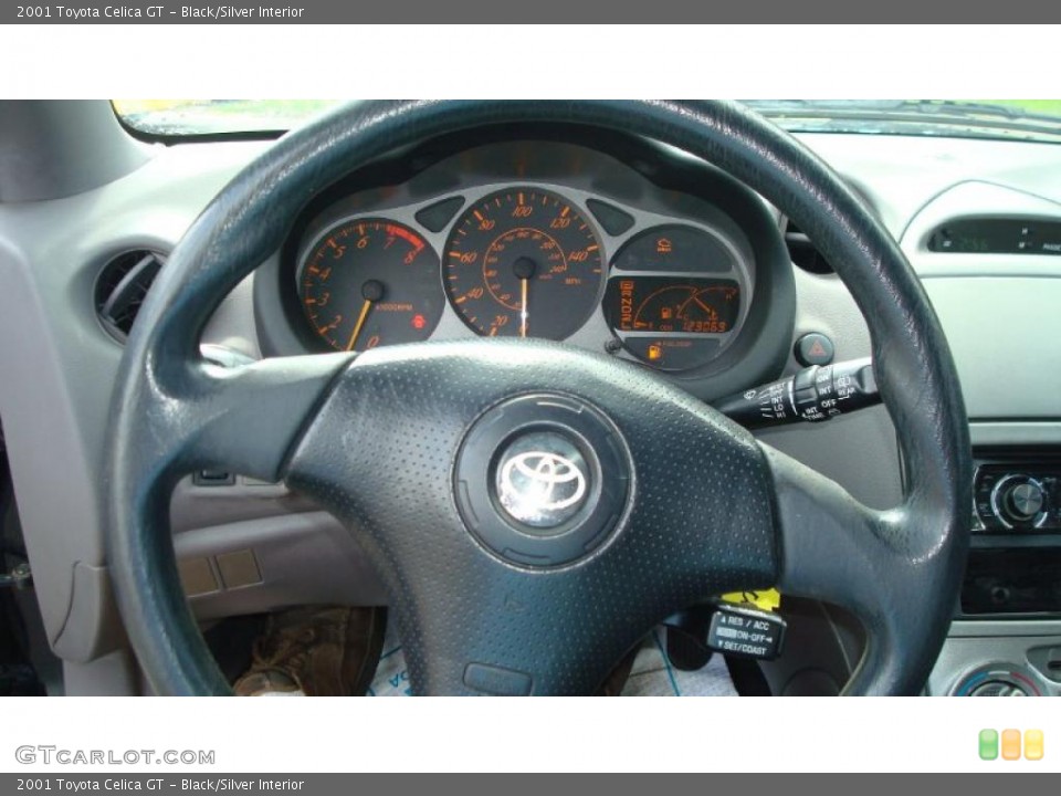 Black/Silver Interior Steering Wheel for the 2001 Toyota Celica GT #48102216