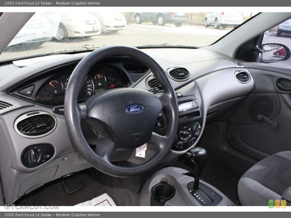 Medium Graphite Interior Dashboard for the 2003 Ford Focus LX Sedan #48114783