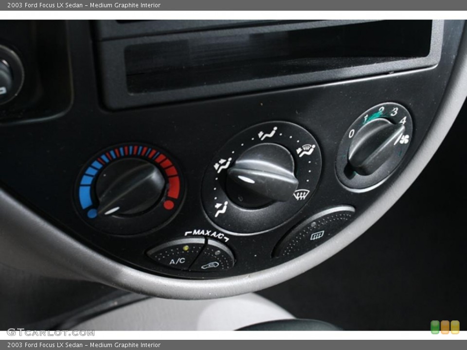 Medium Graphite Interior Controls for the 2003 Ford Focus LX Sedan #48114918