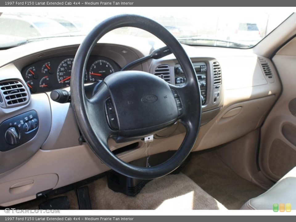 Medium Prairie Tan Interior Dashboard for the 1997 Ford F150 Lariat Extended Cab 4x4 #48118776