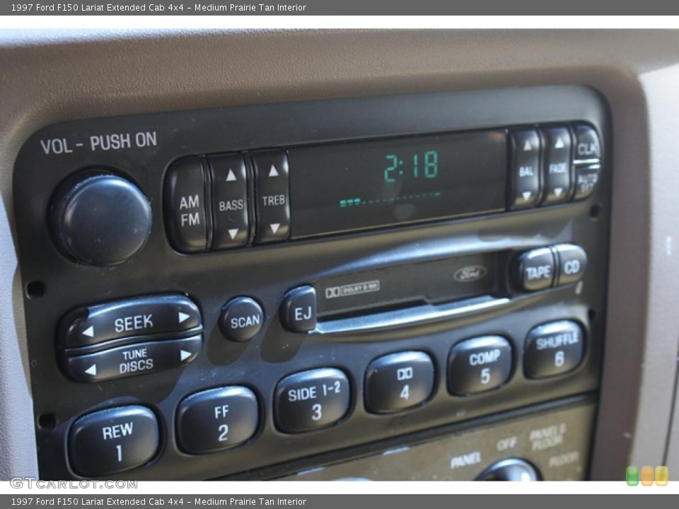 Medium Prairie Tan Interior Controls for the 1997 Ford F150 Lariat Extended Cab 4x4 #48118911