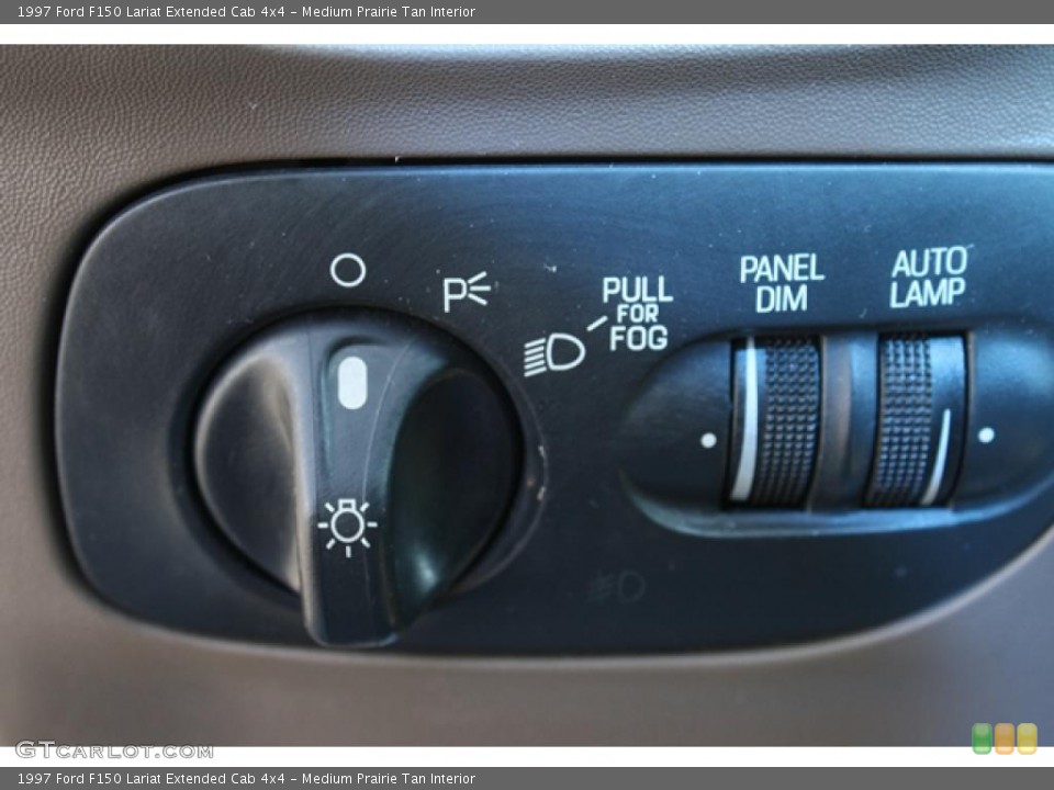 Medium Prairie Tan Interior Controls for the 1997 Ford F150 Lariat Extended Cab 4x4 #48118950