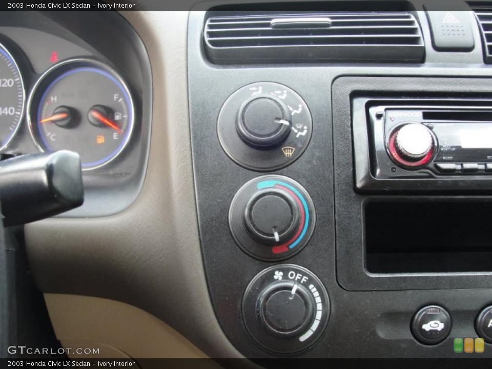 Ivory Interior Controls for the 2003 Honda Civic LX Sedan #48135130