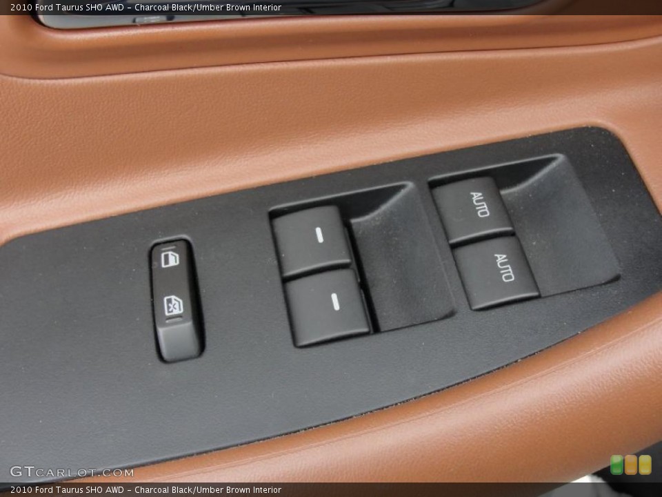 Charcoal Black/Umber Brown Interior Controls for the 2010 Ford Taurus SHO AWD #48140340
