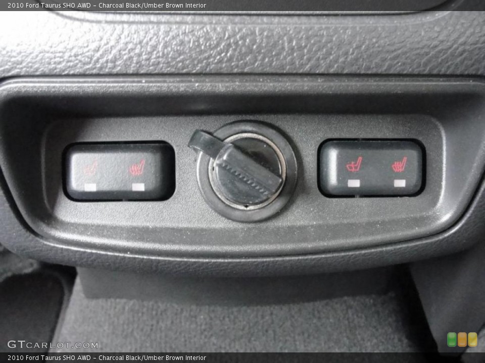 Charcoal Black/Umber Brown Interior Controls for the 2010 Ford Taurus SHO AWD #48140385