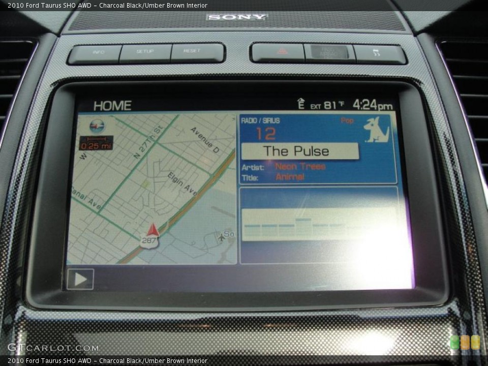 Charcoal Black/Umber Brown Interior Navigation for the 2010 Ford Taurus SHO AWD #48140460
