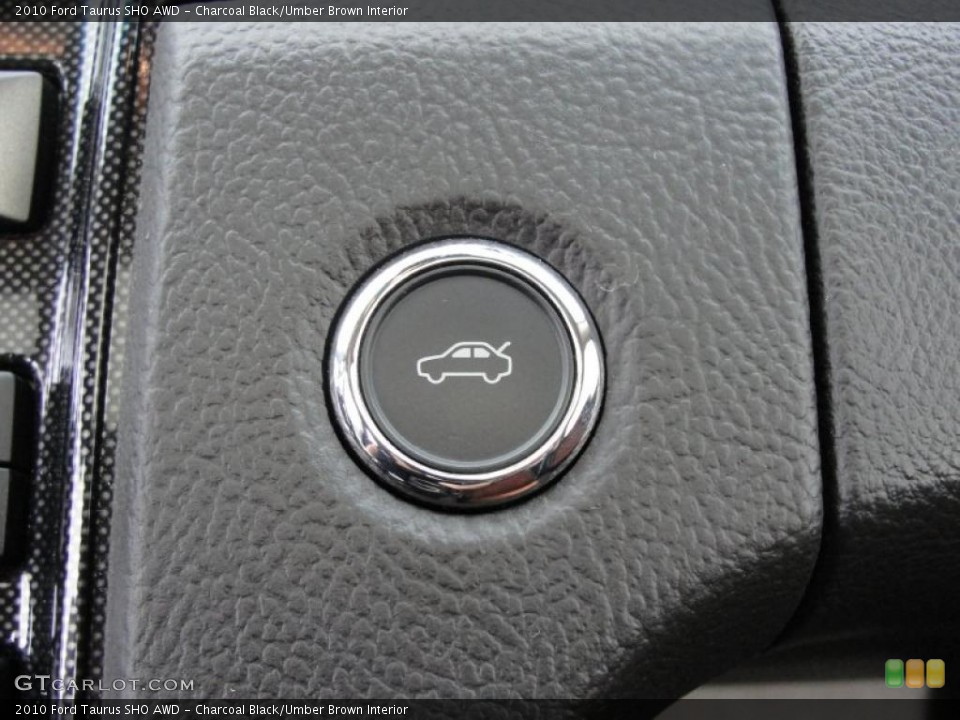 Charcoal Black/Umber Brown Interior Controls for the 2010 Ford Taurus SHO AWD #48140490