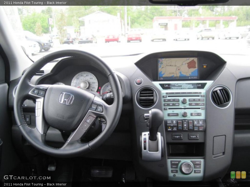Black Interior Dashboard for the 2011 Honda Pilot Touring #48165578