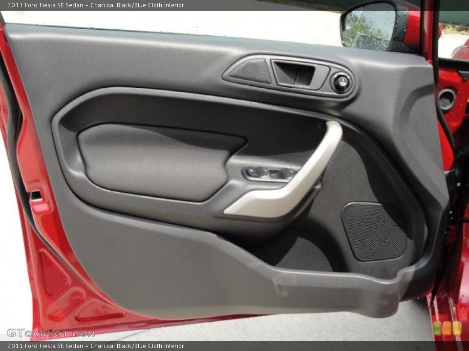 Charcoal Black/Blue Cloth Interior Door Panel for the 2011 Ford Fiesta SE Sedan #48195253