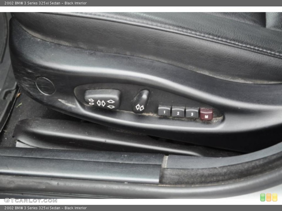 Black Interior Controls for the 2002 BMW 3 Series 325xi Sedan #48199534