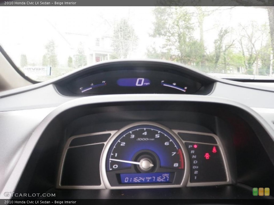 Beige Interior Gauges for the 2010 Honda Civic LX Sedan #48230306