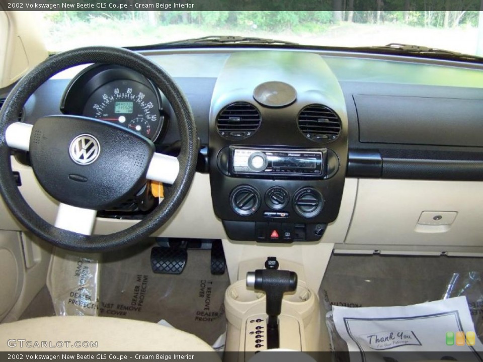 Cream Beige Interior Dashboard for the 2002 Volkswagen New Beetle GLS Coupe #48234573