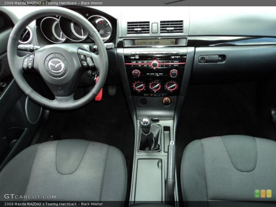 Black Interior Dashboard for the 2009 Mazda MAZDA3 s Touring Hatchback #48244938