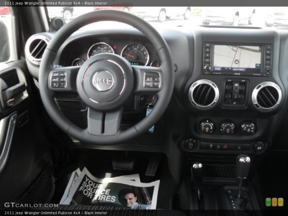 Black Interior Dashboard for the 2011 Jeep Wrangler Unlimited Rubicon 4x4 #48252936