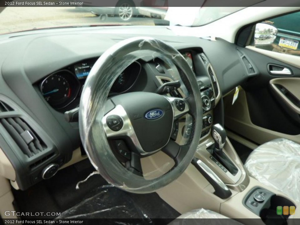 Stone Interior Dashboard for the 2012 Ford Focus SEL Sedan #48253188