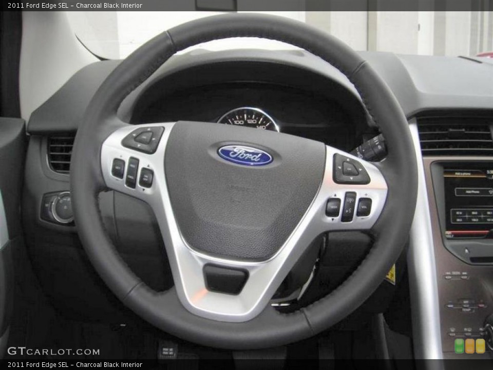 Charcoal Black Interior Steering Wheel for the 2011 Ford Edge SEL #48254322