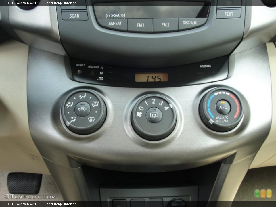 Sand Beige Interior Controls for the 2011 Toyota RAV4 I4 #48275392