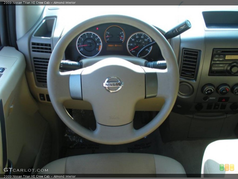 Almond Interior Steering Wheel for the 2009 Nissan Titan XE Crew Cab #48283882