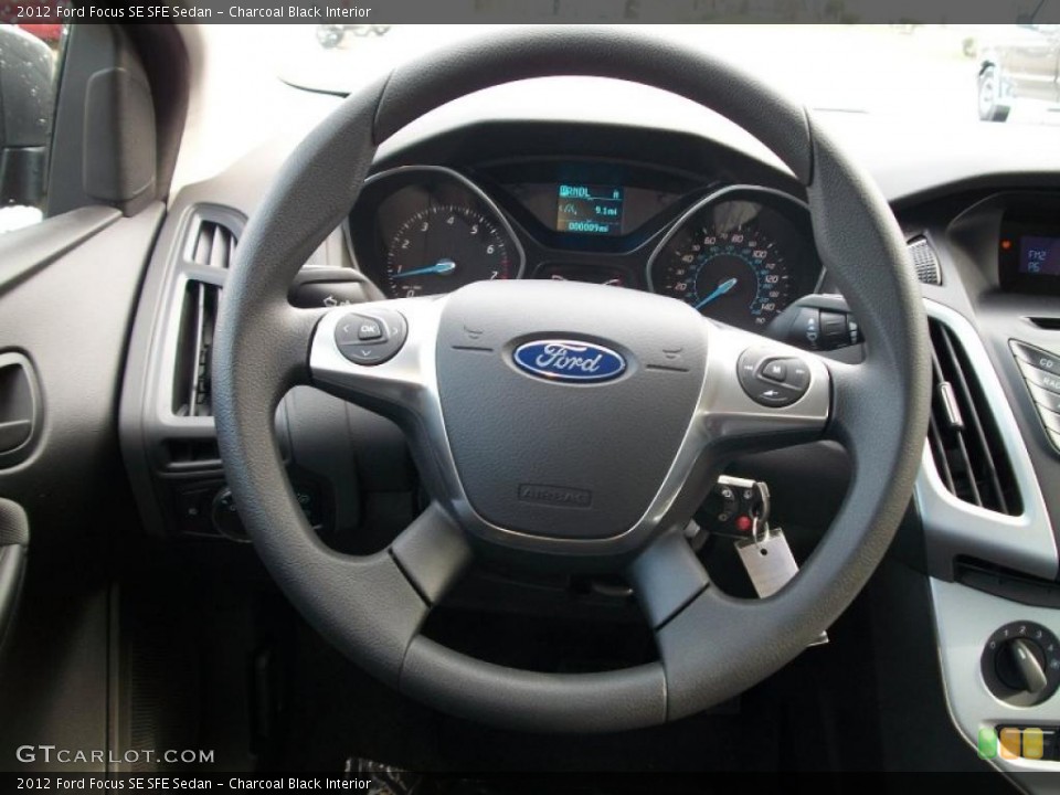 Charcoal Black Interior Steering Wheel for the 2012 Ford Focus SE SFE Sedan #48291168
