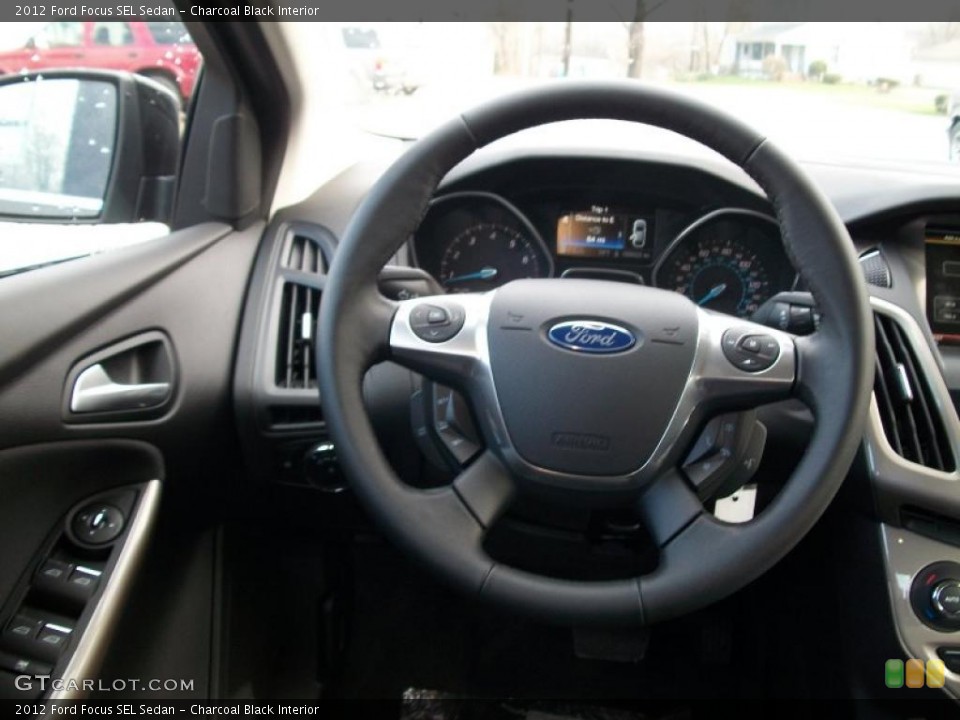 Charcoal Black Interior Steering Wheel for the 2012 Ford Focus SEL Sedan #48291325