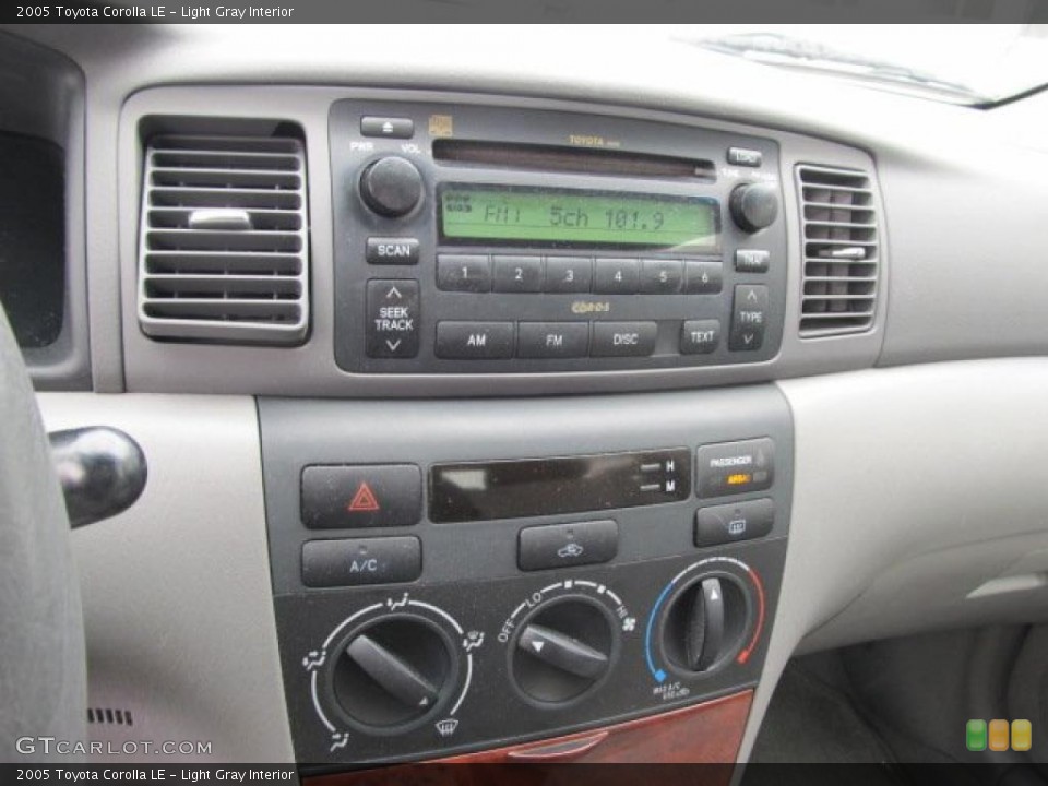 Light Gray Interior Controls for the 2005 Toyota Corolla LE #48294381