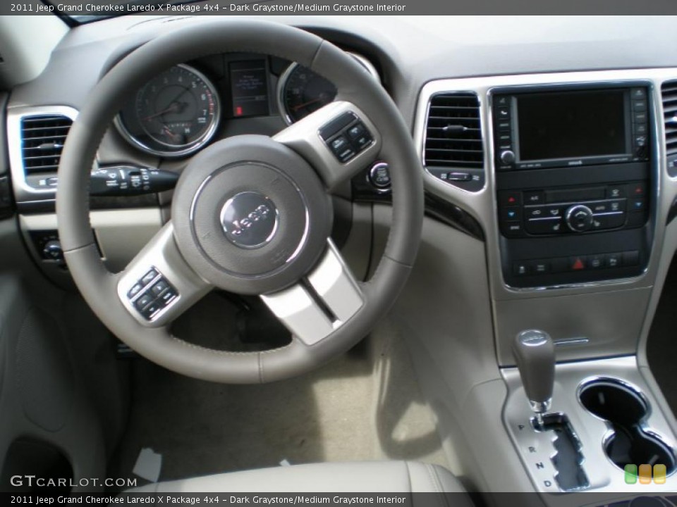 Dark Graystone/Medium Graystone Interior Dashboard for the 2011 Jeep Grand Cherokee Laredo X Package 4x4 #48297766