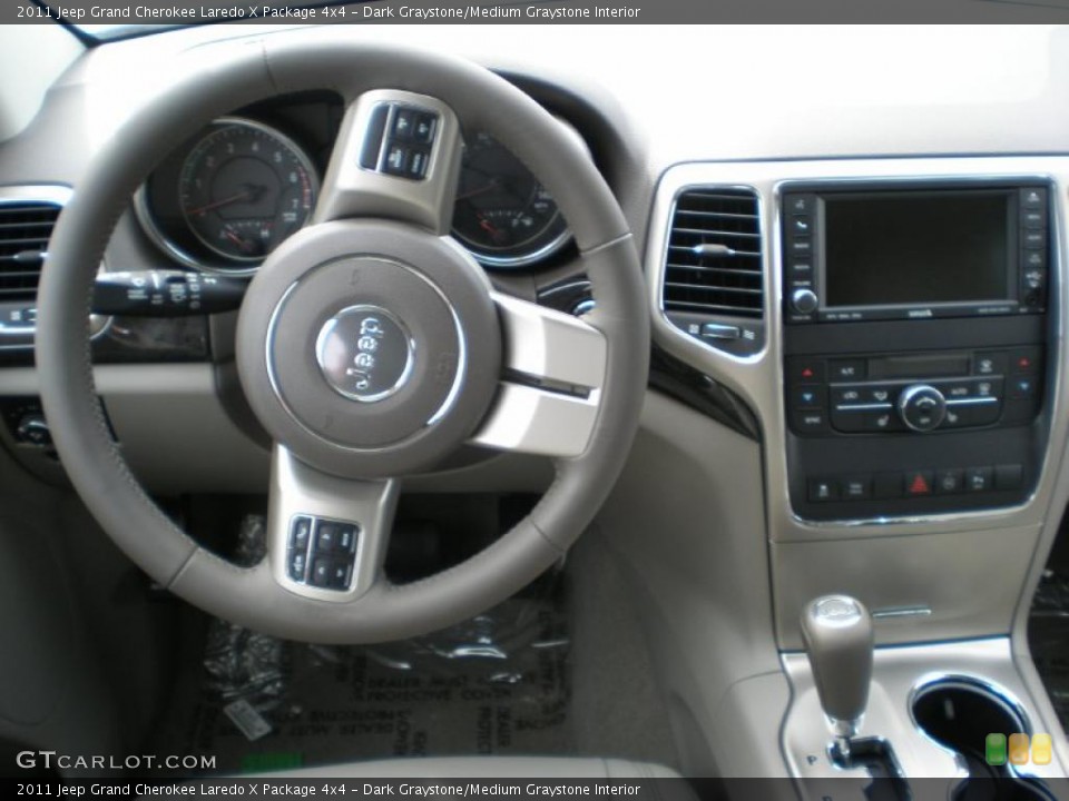 Dark Graystone/Medium Graystone Interior Dashboard for the 2011 Jeep Grand Cherokee Laredo X Package 4x4 #48297886