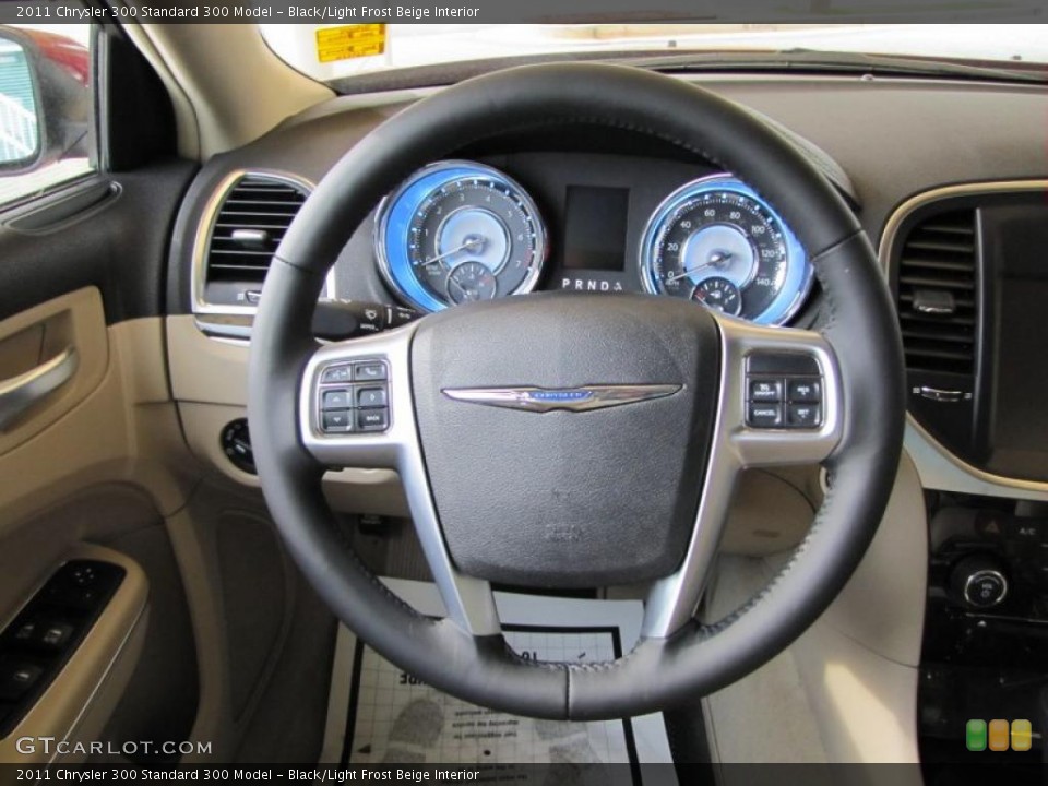 Black/Light Frost Beige Interior Steering Wheel for the 2011 Chrysler 300  #48301627