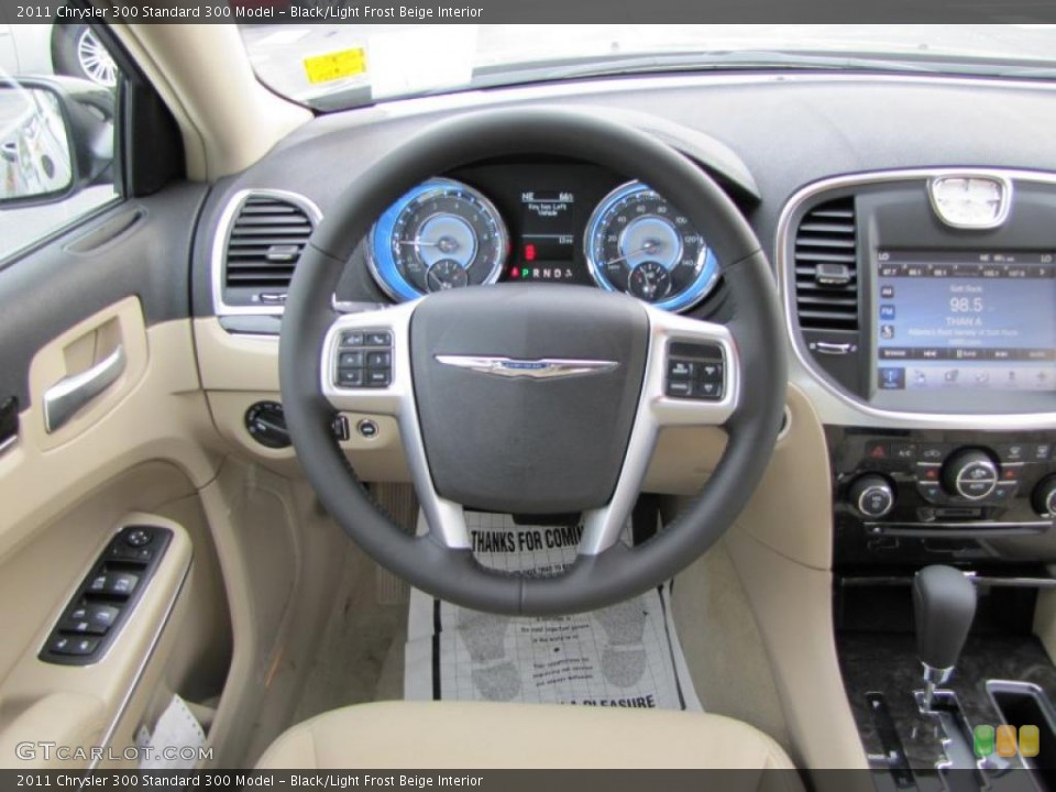 Black/Light Frost Beige Interior Steering Wheel for the 2011 Chrysler 300  #48301807