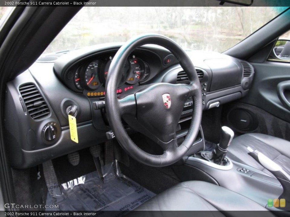 Black Interior Steering Wheel for the 2002 Porsche 911 Carrera Cabriolet #48313039