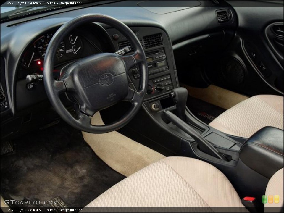 Beige Interior Prime Interior for the 1997 Toyota Celica ST Coupe #48317678