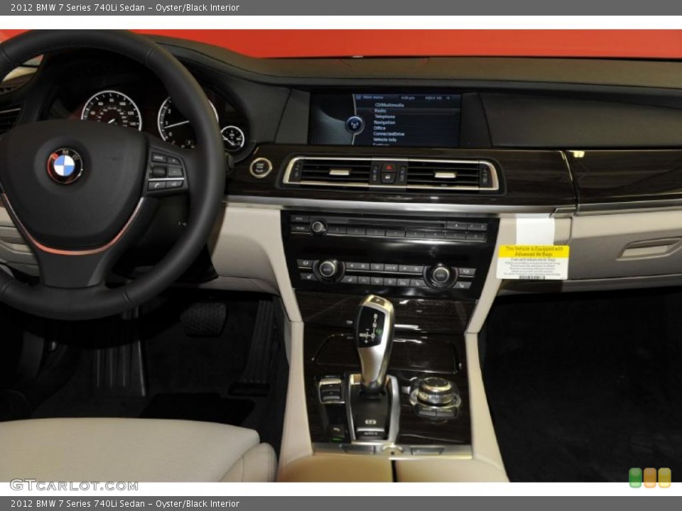 Oyster/Black Interior Controls for the 2012 BMW 7 Series 740Li Sedan #48330154
