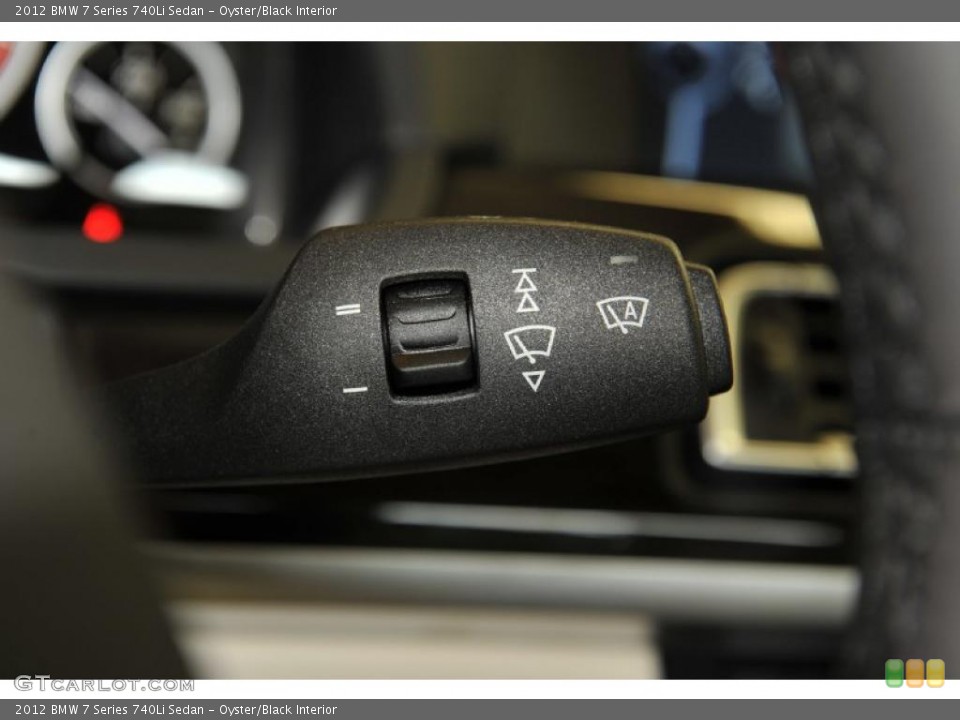 Oyster/Black Interior Controls for the 2012 BMW 7 Series 740Li Sedan #48330202