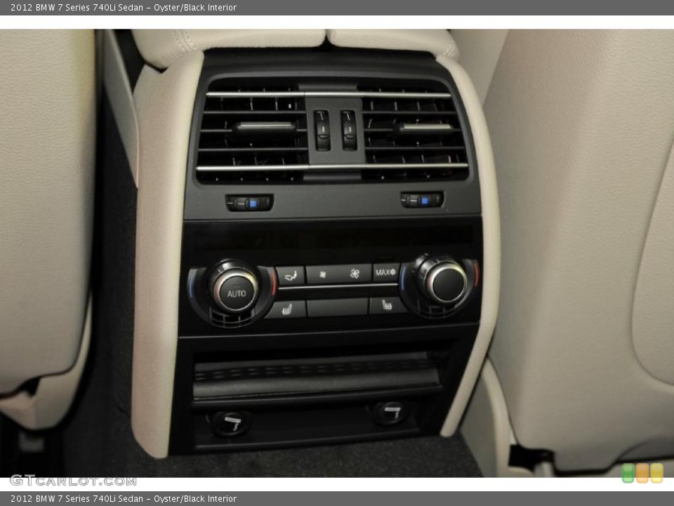 Oyster/Black Interior Controls for the 2012 BMW 7 Series 740Li Sedan #48330340