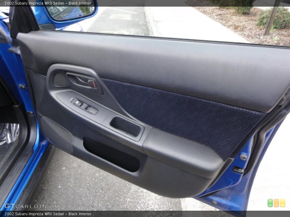 Black Interior Door Panel for the 2002 Subaru Impreza WRX Sedan #48333604