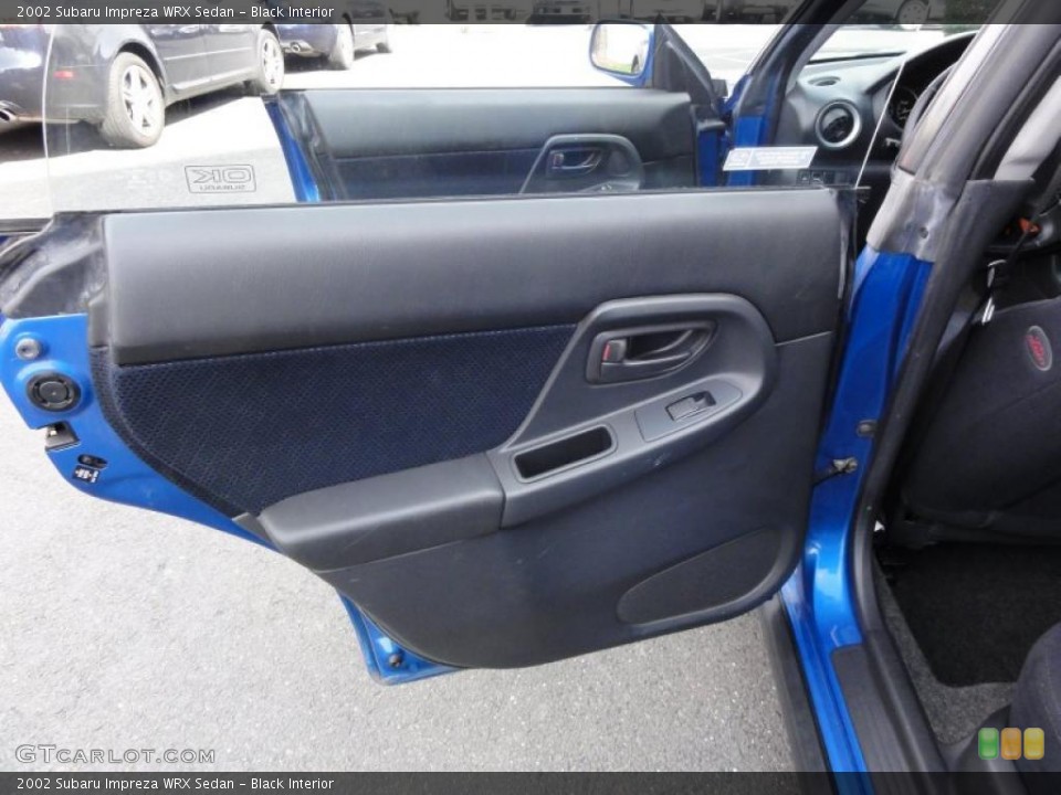 Black Interior Door Panel for the 2002 Subaru Impreza WRX Sedan #48333640