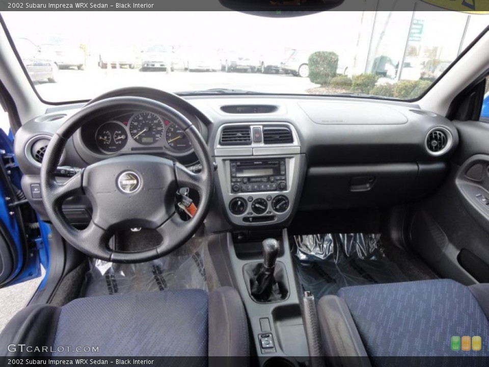 Black Interior Dashboard for the 2002 Subaru Impreza WRX Sedan #48333670